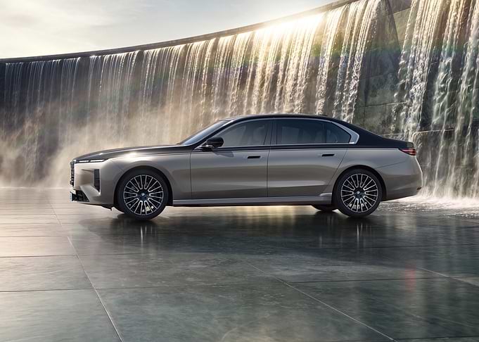Luxury Sedan by Waterfall