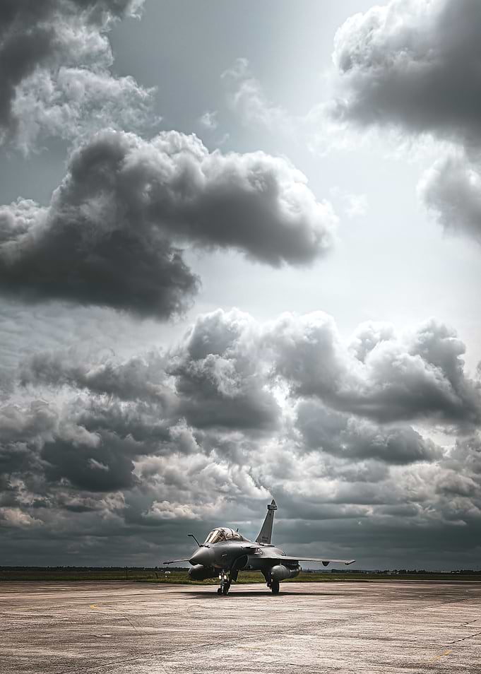 Rafale B on Tarmac Under Stormy Skies