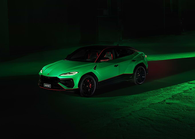 Green Lamborghini Urus with Red Accents