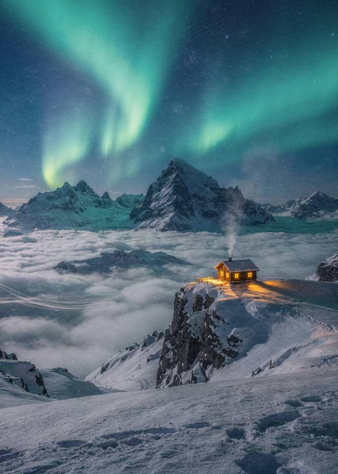 Cozy Cabin Under Aurora Borealis