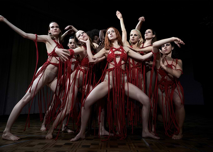 Dancers in Red Rope Costumes