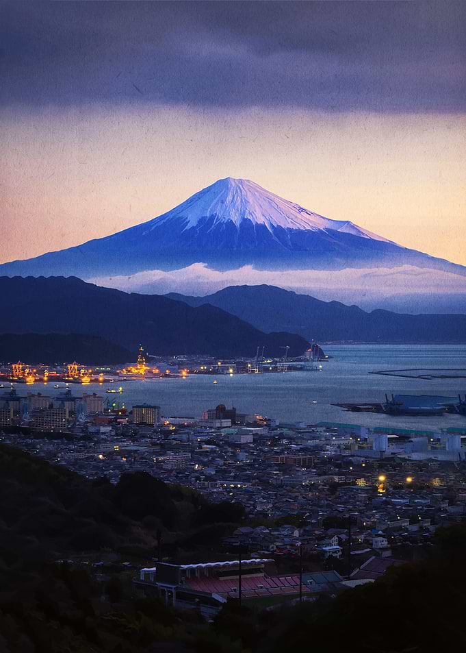 Mount Fuji Over Cityscape at Dusk