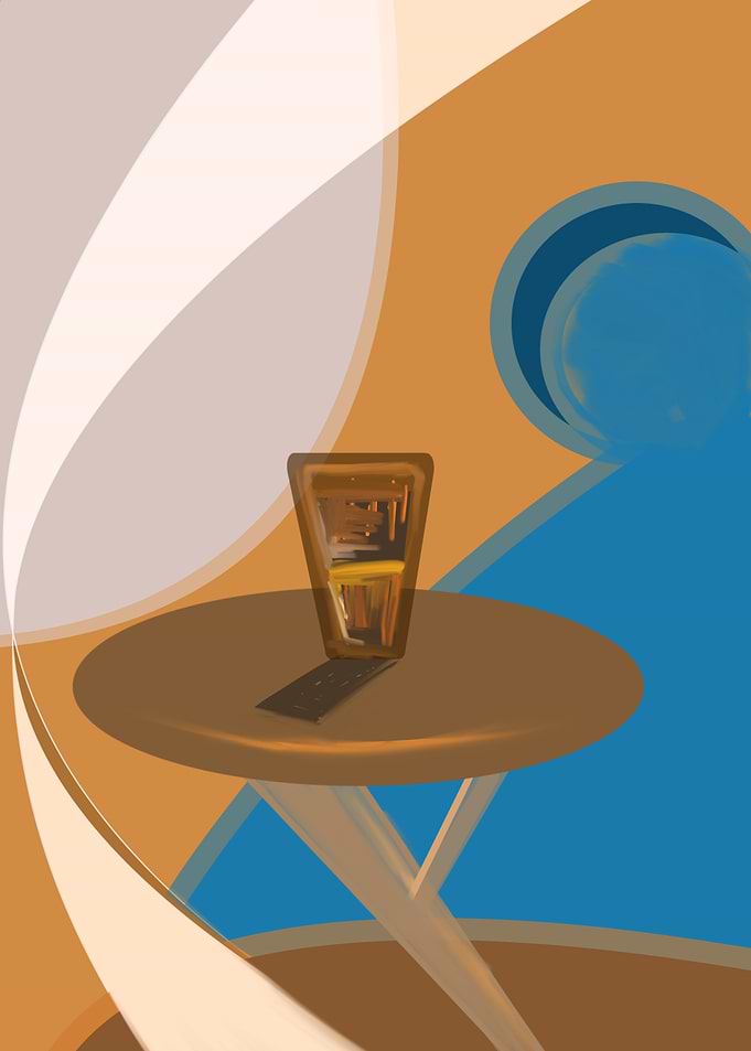 Glass of Amber Liquid on a Table