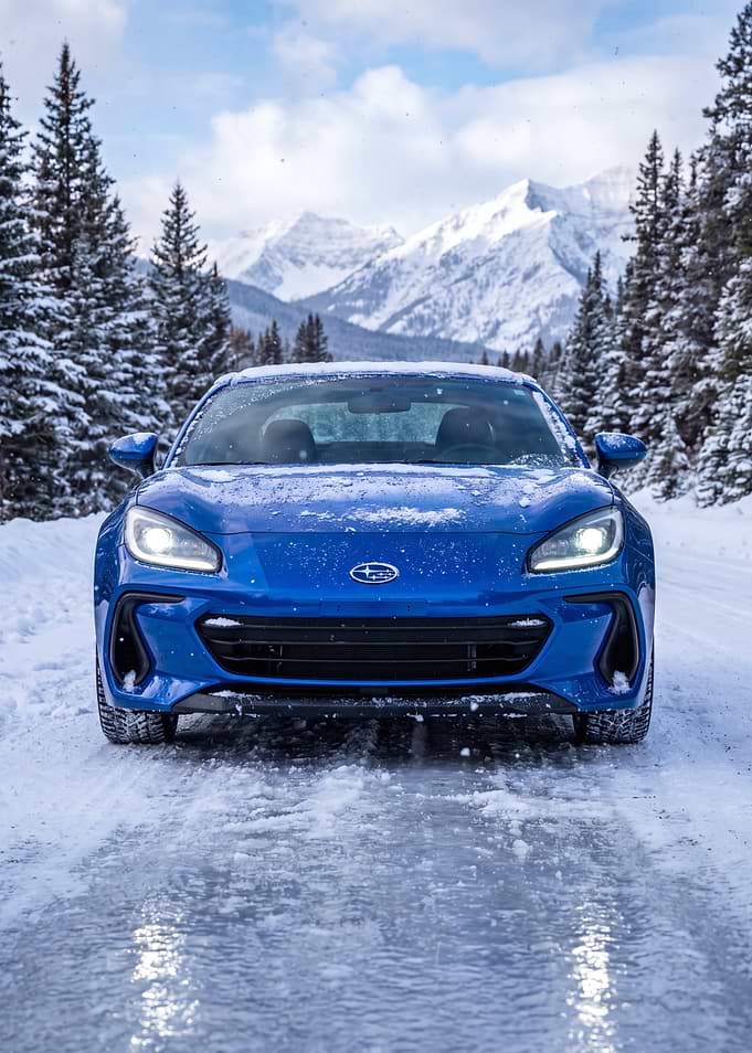 Blue Subaru BRZ on Snow Mountain
