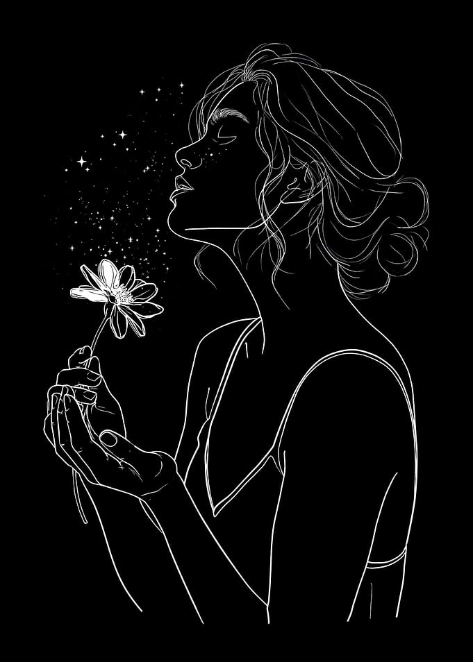 Woman smelling a flower with stars