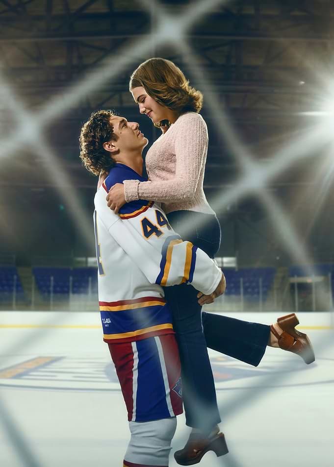 Hockey Player Hugs Girlfriend