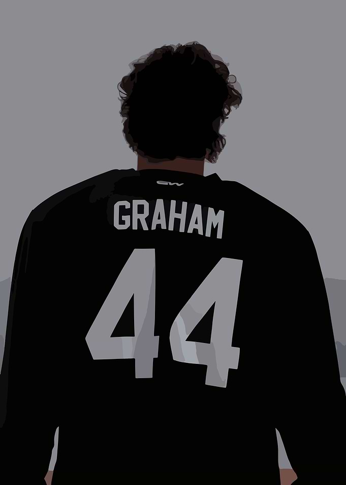 Person in a Black Jersey with Number 44