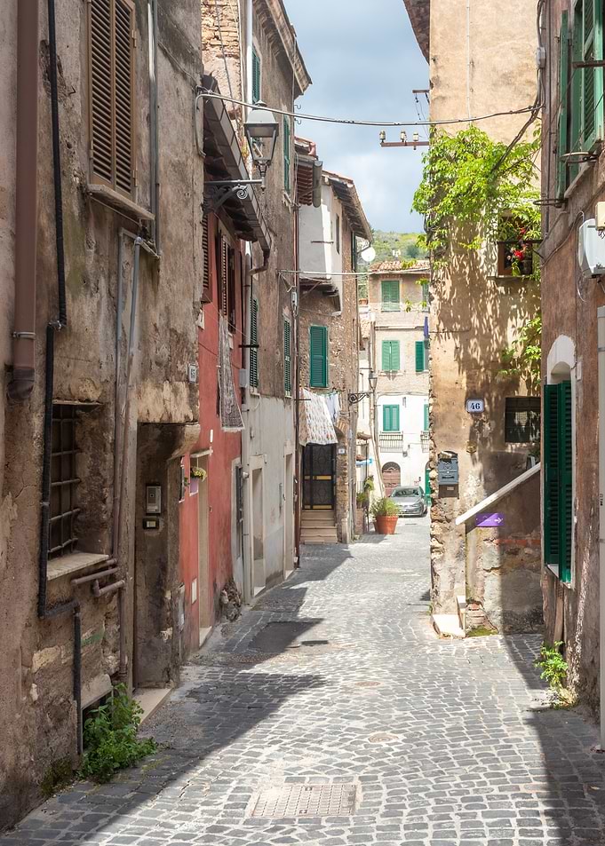 Narrow European Street with Cobblestones