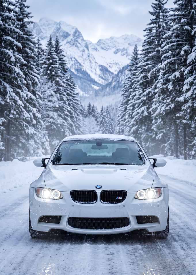 White BMW M3 in Snowy Forest