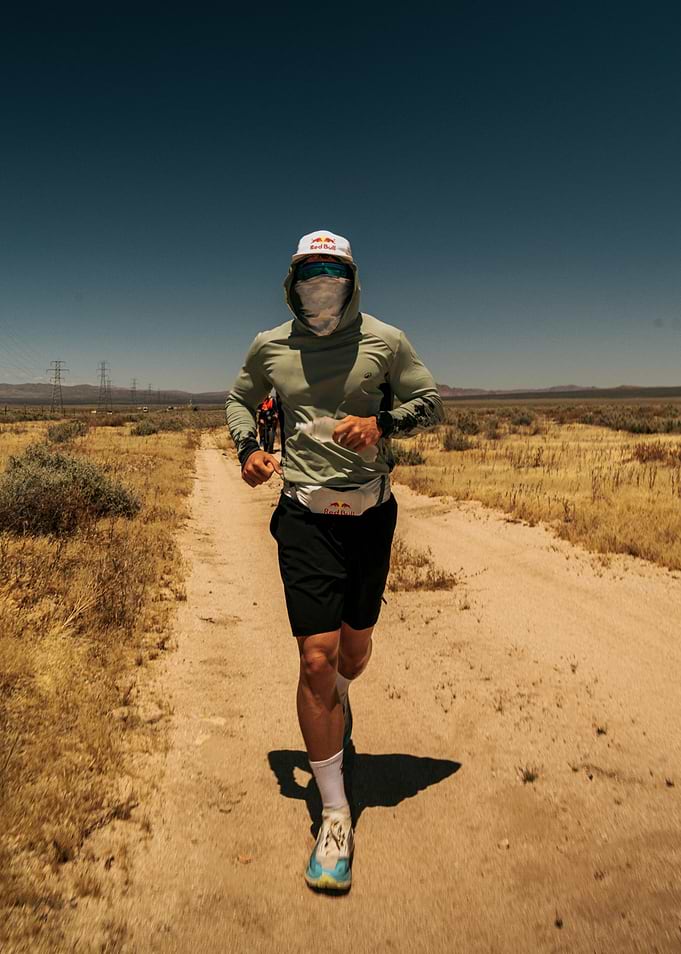 Athlete running on a desert trail