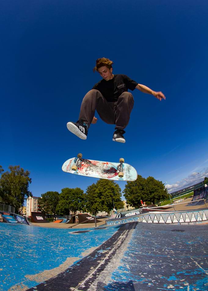 Skateboarder mid-air trick