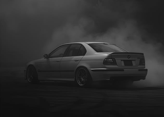 Drifting BMW Sedan in Smoke