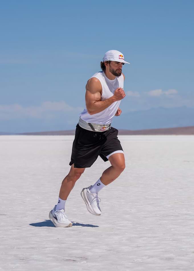 Athlete running on a salt flat