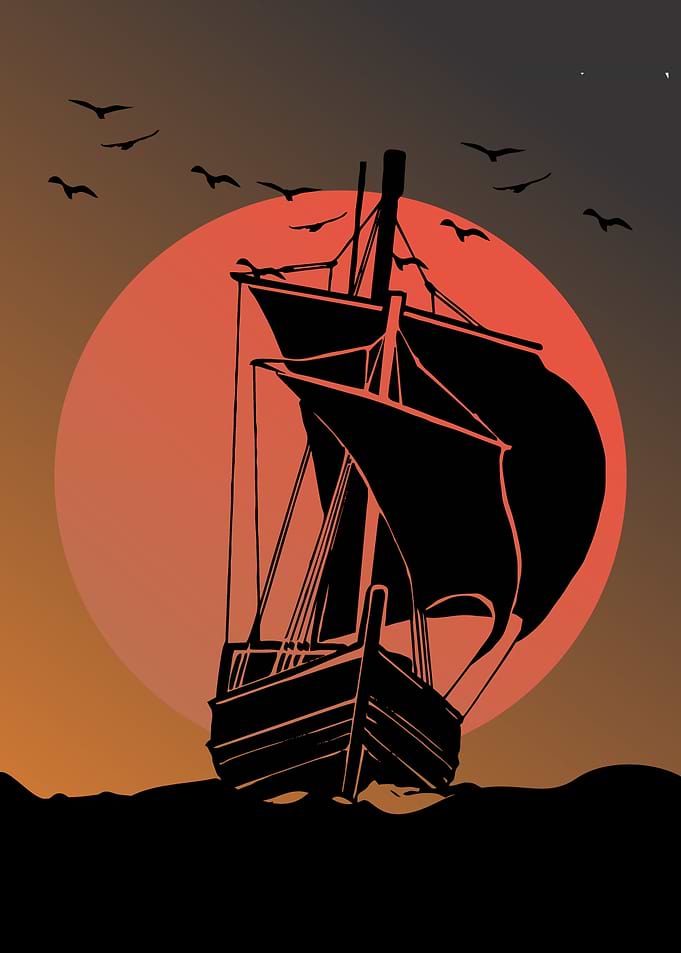 Silhouette of a ship at sunset