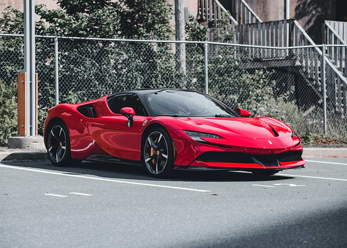 Red Ferrari SF90 Stradale in Parking Lot