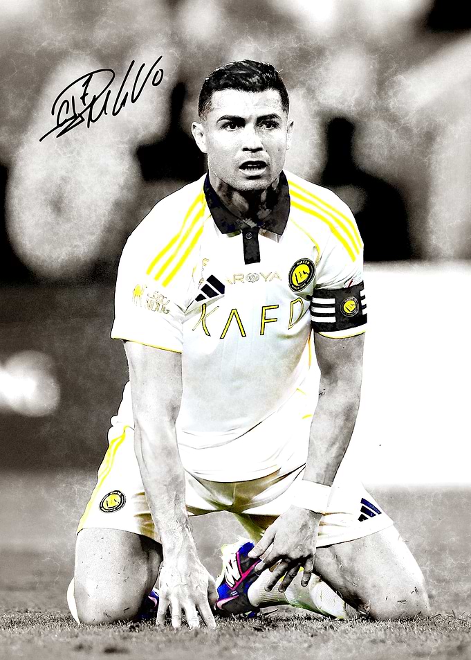 Cristiano Ronaldo kneeling on field