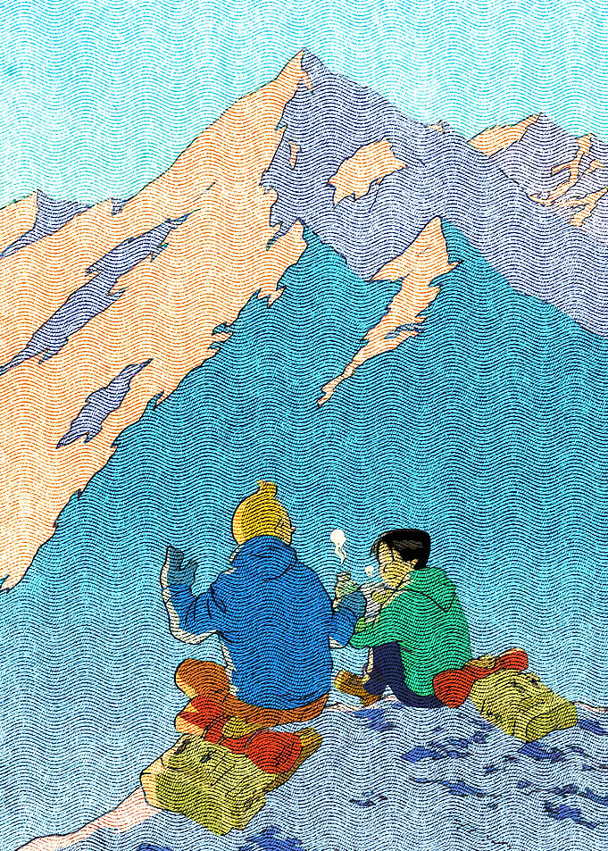 Two hikers enjoying mountain view