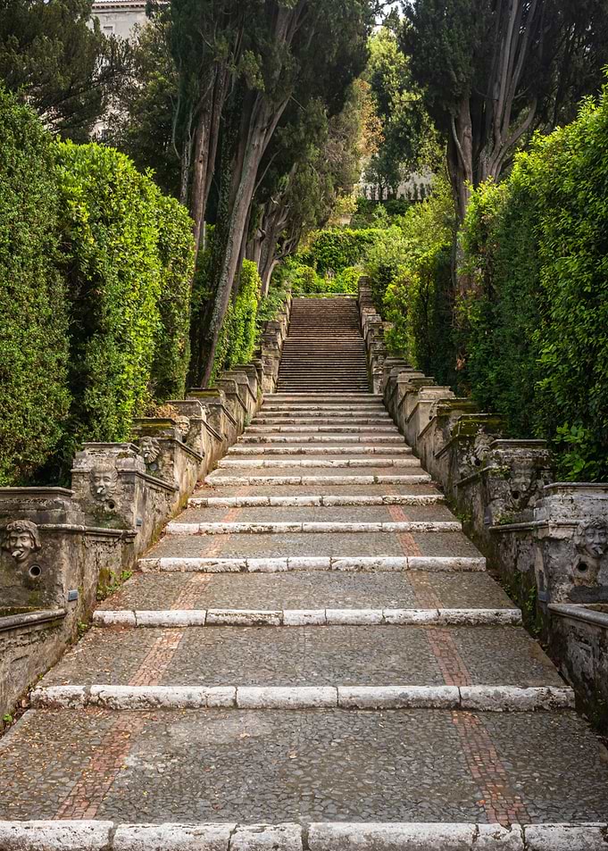 Grand Stone Staircase in Lush Garden
