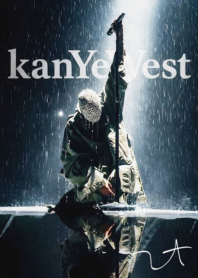 Kanye West performing in the rain