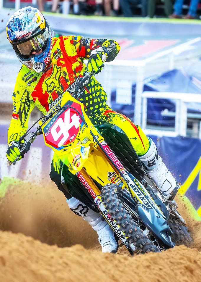 Motocross Racer in Yellow and Red Gear