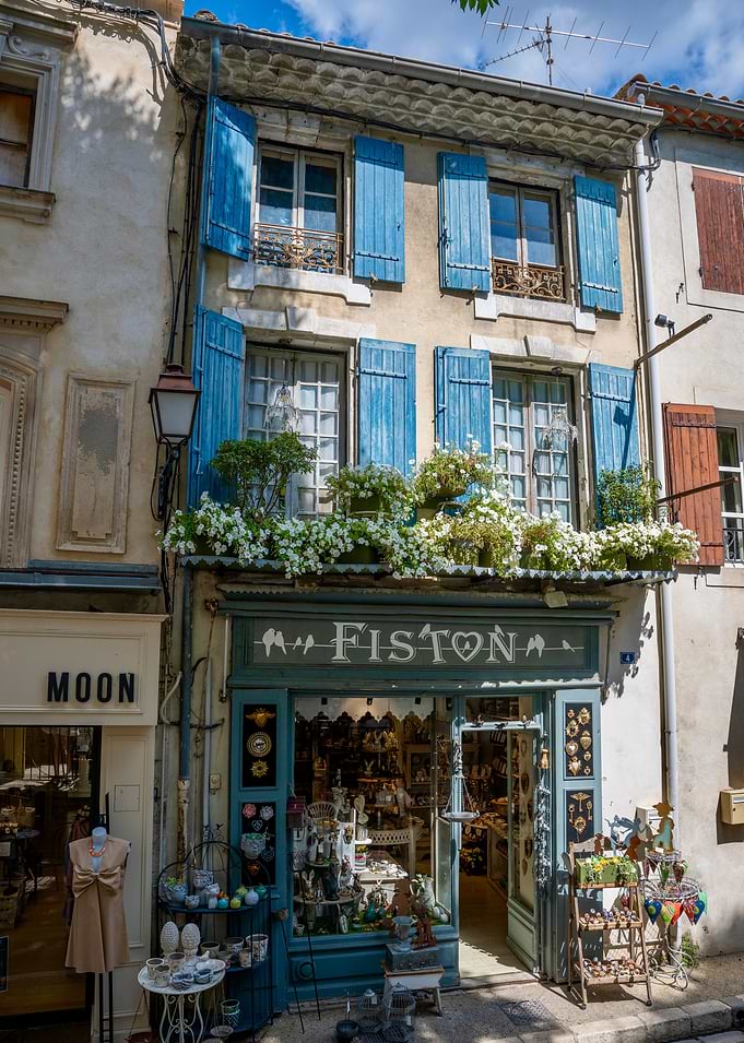 Charming French Boutique with Blue Shutters