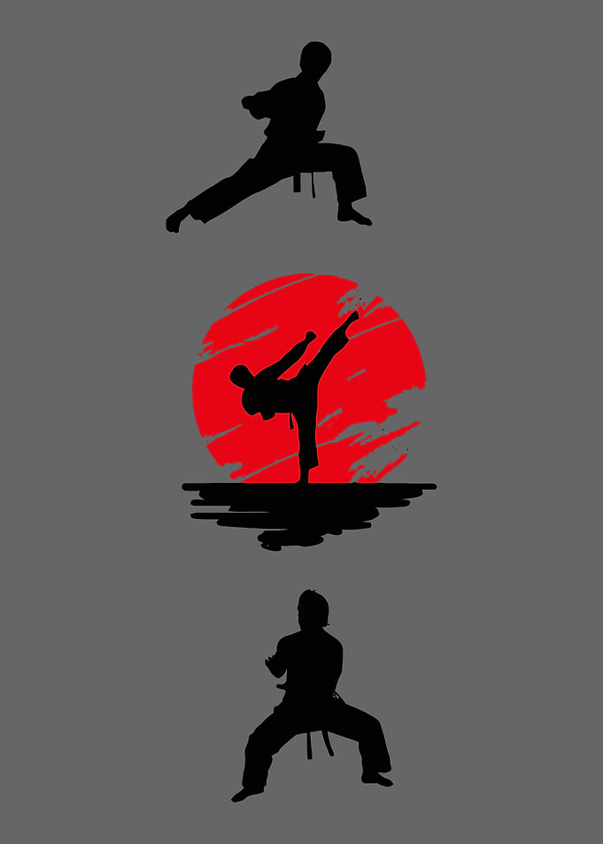Karate silhouettes with red sun