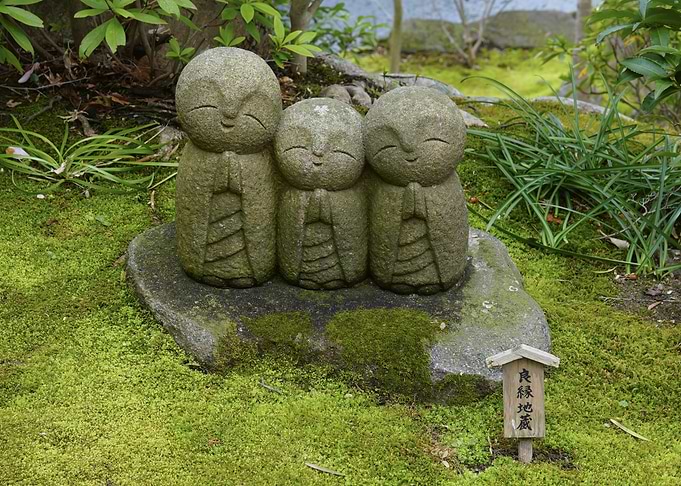 Three Stone Jizo Statues in Moss Garden