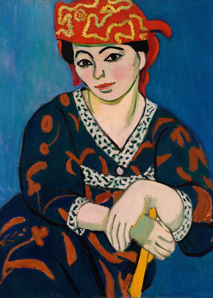 Woman in Red Hat and Blue Dress