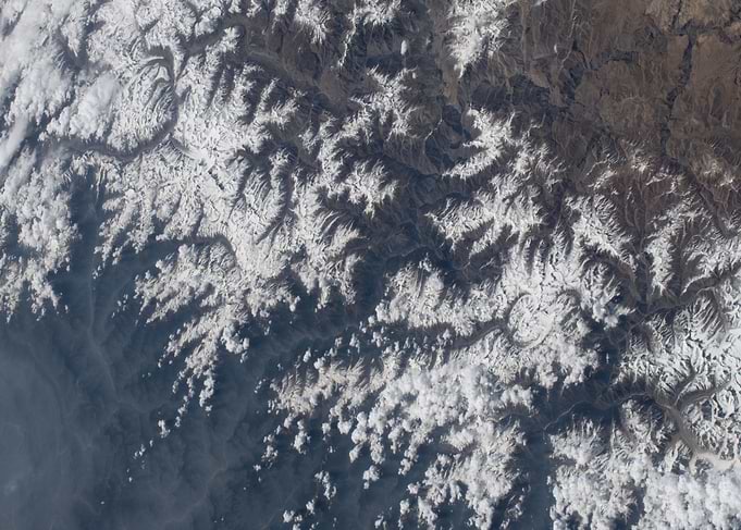 Snow-Capped Mountain Range from Space
