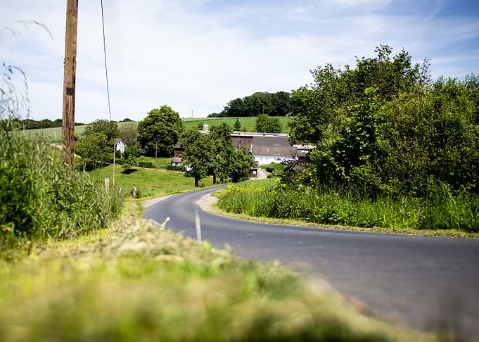 Winding Road Through a Rural Landscape