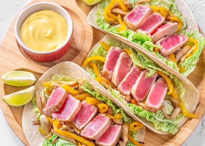 Seared Tuna Tacos with Sauce and Lime