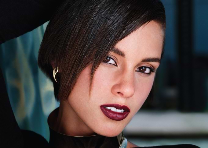 Woman with dark lipstick and short hair