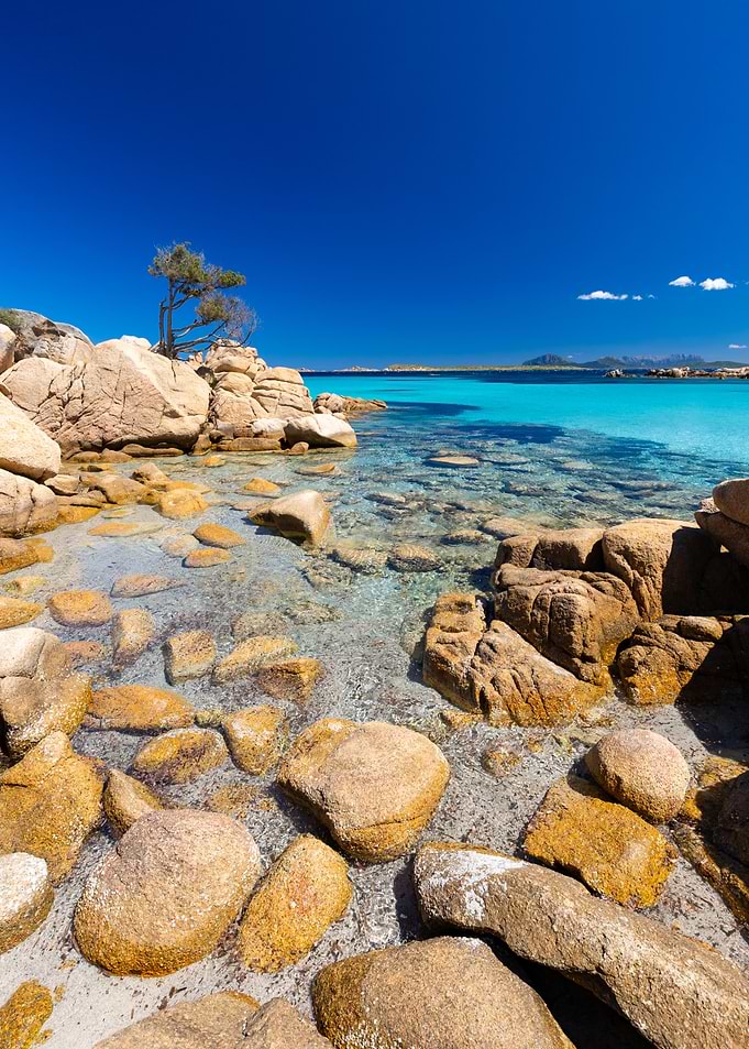 Tropical Beach with Turquoise Water and Rocks