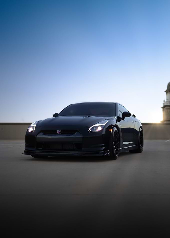 Black Nissan GT-R at Sunset