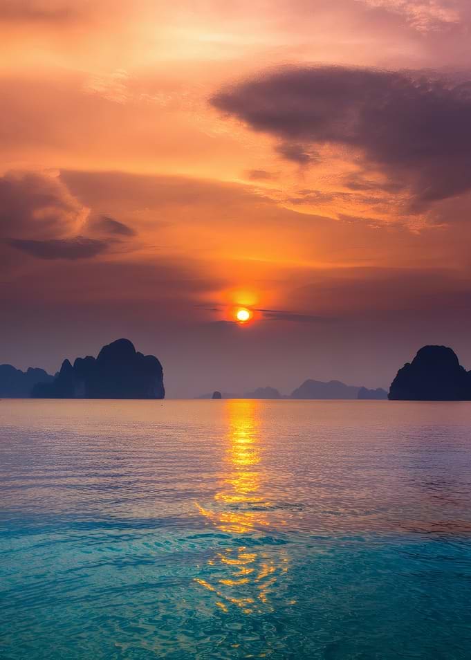 Tropical Islands at Dusk – Sunset Over Turquoise Waters