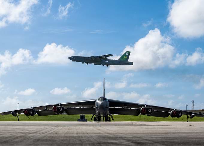 Two B-52 Bombers in the Sky and on the Ground