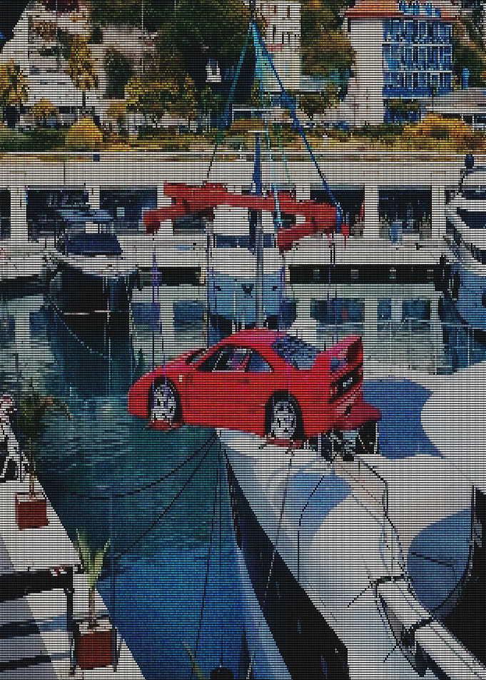Red Ferrari F40 Lifted Over Yacht
