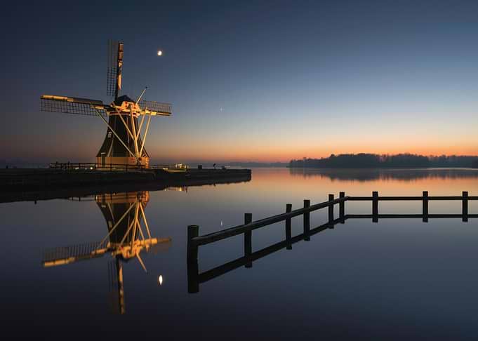 Windmill reflection at dawn