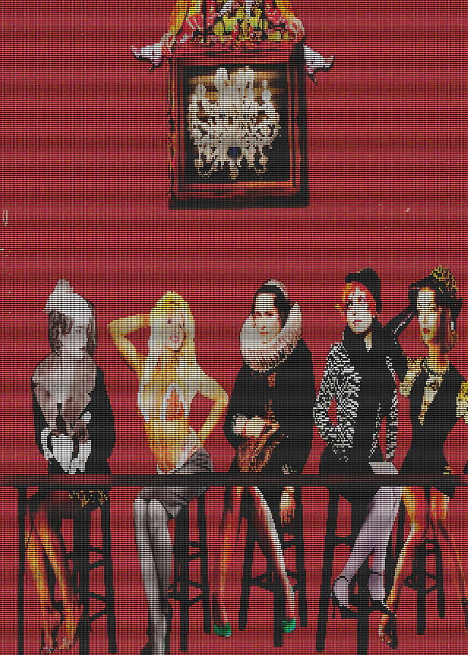 Five women in vintage fashion at a bar