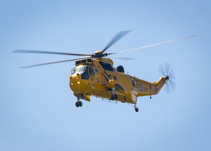 Yellow RAF Sea King Rescue Helicopter in Flight