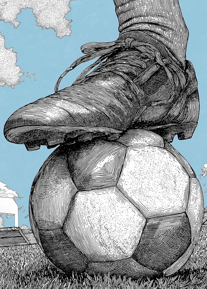 Soccer Player's Foot on Ball