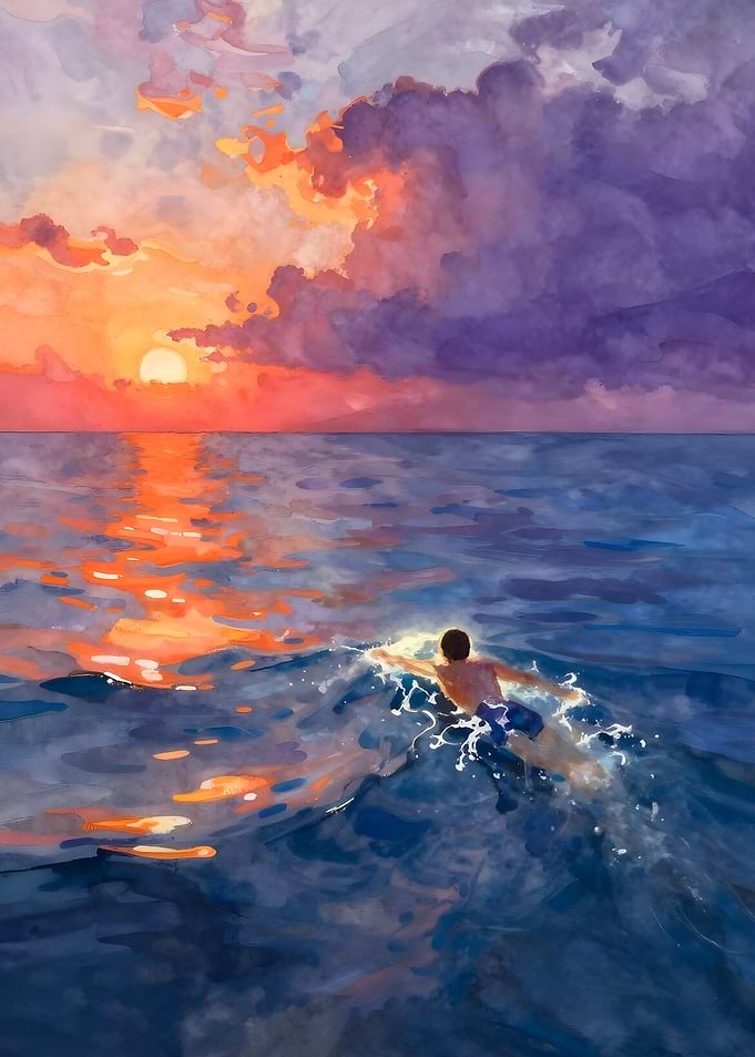 Man swimming at sunset