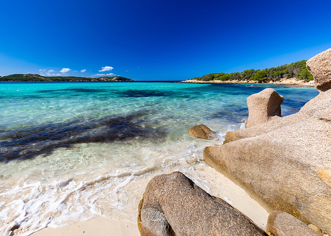 Turquoise water and rocky beach