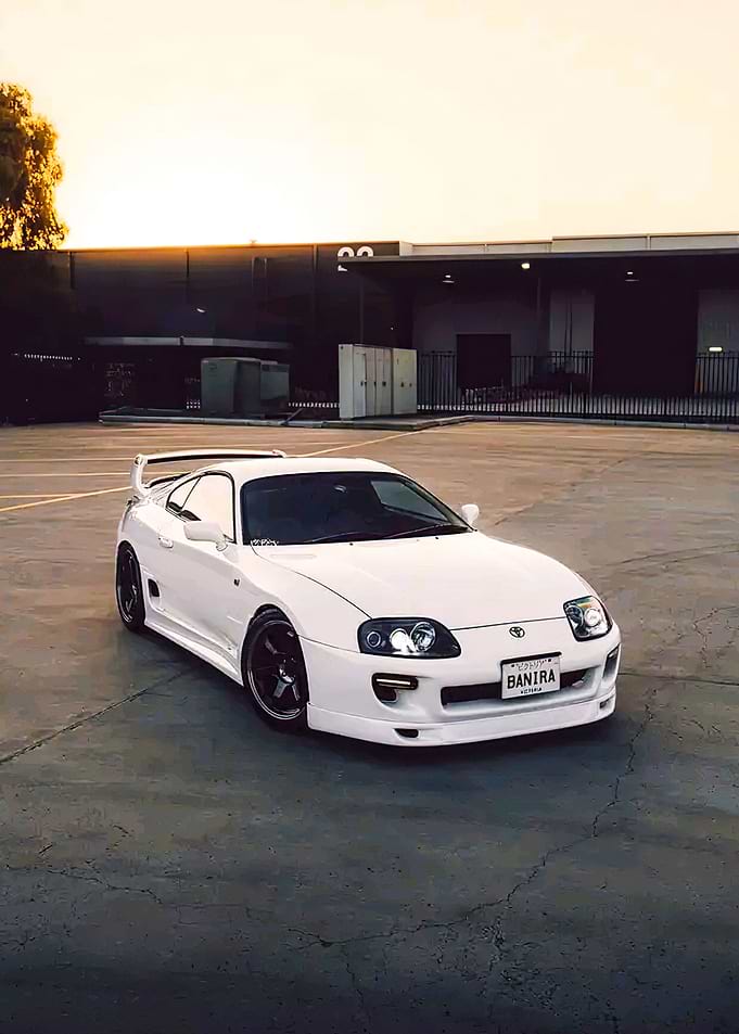 White Toyota Supra with Custom Wheels