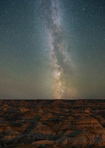 Milky Way over Badlands Landscape