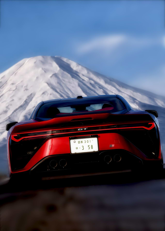 Red Sports Car with Mount Fuji Background