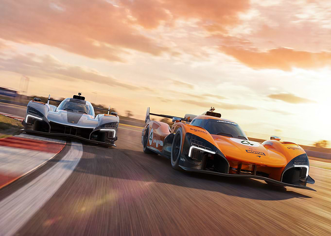 Race Cars on Track at Sunset