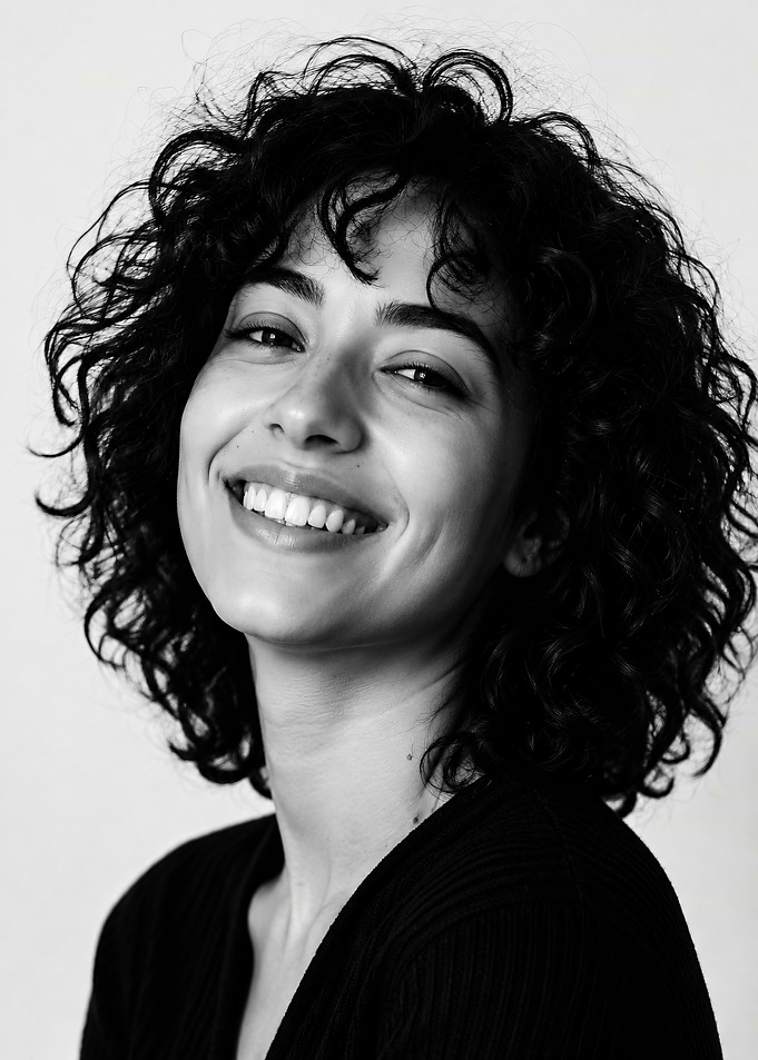 Black and White Portrait of a Smiling Woman