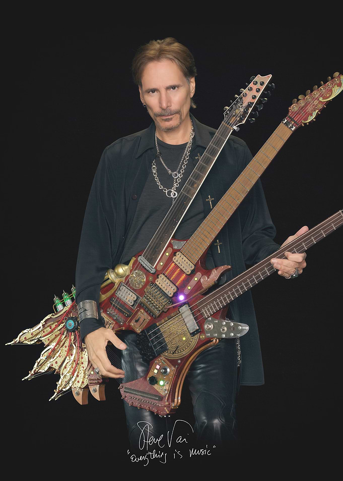 Steve Vai with custom guitars