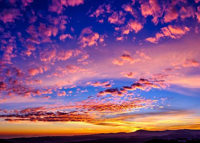 Dramatic Sunset Over Mountains
